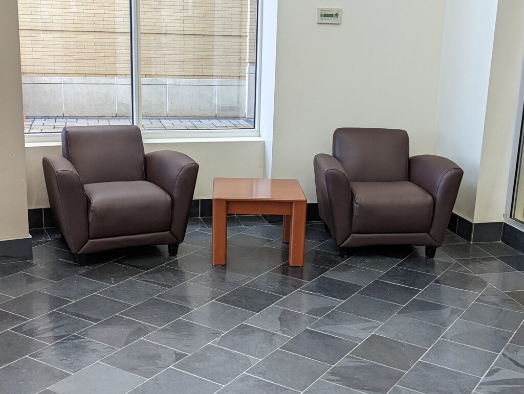 Arm chair at the gym reupholstered in vinyl by vinyl Pro Company
